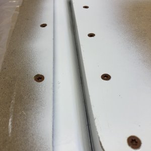 Here's the assembled mold ready to fill with epoxy resin and fiberglass. The molds were constructed from MDF, painted white with three coats of lacquer, and then sealed with six coats of mold release wax.