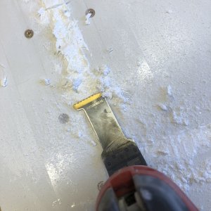 One day later I used a multitool to remove most of the excess epoxy.
