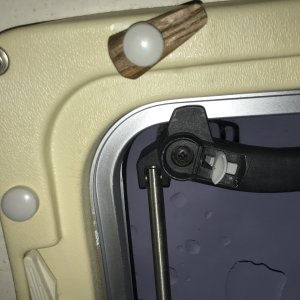 Vberth hatch latch screw to adjust tightness of latch