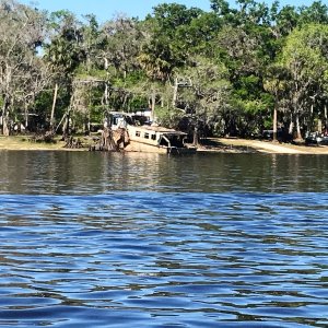 Sunk Houseboat along the River
