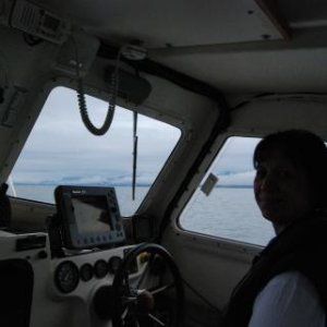 Dee piloting Knotty C on the way to Ketchikan, Alaska