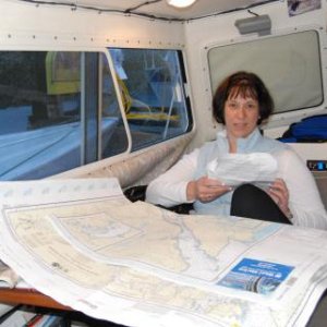 Dee helping plan the next leg of our trip in rainy Ketchikan