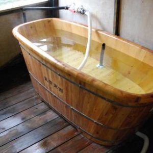 Hand carved wooden tub donated by a ship?s captain