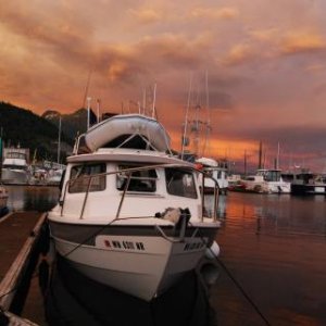 Knotty C back in Ketchikan. Stormy sky just getting ready to open up.