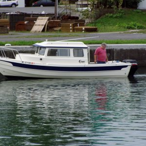 Media 'Ray at Seneca Falls in His 2005 C-22: Checking Out the Twin Suzuki's' in album 'Lock 4 Cayuga-Seneca Canal'