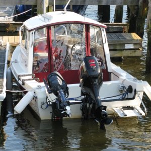 C-Dory 16 Cruiser with Suzuki 40HP 4-Stroke and Yamaha 4HP 4-Stroke Kicker -- Stern view showing security cable placement for kicker
