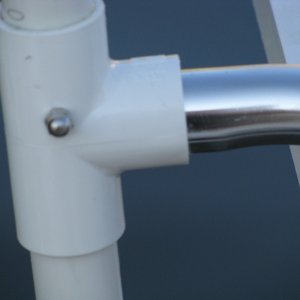 Media 'Boarding Ladder -- The Garelick fits into the PVC T-Joint, and is secured with a SS bolt and nut.' in album 'C-Dory 16 Cruiser with Suzuki 40HP 4-Stroke and Yamaha 4HP 4-Stroke Kicker -- Stern view showing security cable placement for kicker'