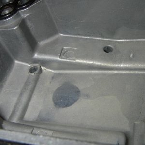 Carb bowl etching, due to prolong sitting with e-10 gas, possibly without Marine Stabil in it.