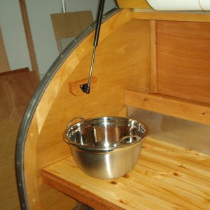 Sink made from 2 bowles. One is bolted down and the other fits into it. Add handles, Simply pull out and dump.