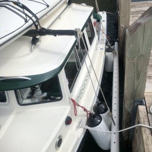 Media 'Beside Michigan Island Dock in 2-3 ft seas, winds into port side' in album 'Fender Board side view'