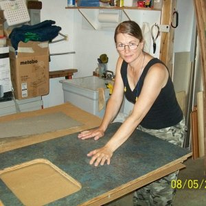 Gluing the new formica in place
