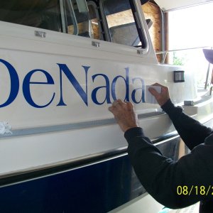 Applying the vinyl letters.