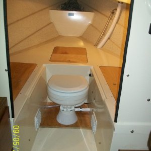 Marine head and VB storage hatches