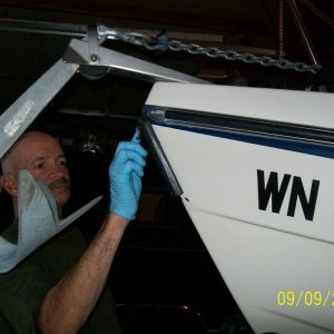 Installing the anchor guard on the bow
