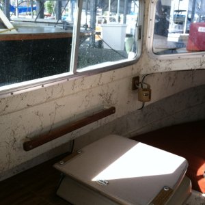 Port seat folded for photo.