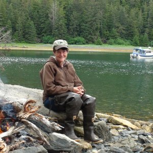 The Alaska looking girl by the fire in front of our Falcon Arm anchorage where the storm caught us