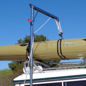 Close-up of our newly installed Garhauer Lift after lifting our 87 pound Hobie Mirage Tandem Kayak securely on top of Katmai.