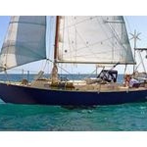 Media 'Under sail. New owner added all the stuff on the transom.  I had a nice seat and a wind vane there.' in album 'Steel boat I built early 1990\'s. Brent Swain 31 cutter.  Twin keel outboard rudder.'