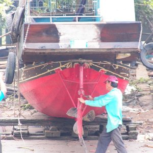 Every little boat repair spot seemed to be occupied.  This is an inboard similar to what we were in.  I saw lots of shiny propellers and not because they were new.