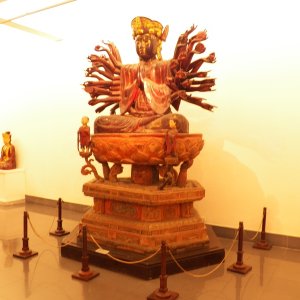 Then this old lady came out and yelled at me.  This is actually my bad photo of Quan Yin, a female iteration (bodhisattva) of the Buddha in the National Museum in Hanoi.  She is flanked by her two little helpers.