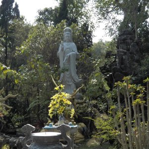 Quan Yin is especially popular with sailors and fishermen.  She is generally accompanied by two helpers; one that can see 1,000 miles and one that can hear 1,000 miles.  That helps keep sailors out of trouble.  A statue of her across the harbor from Danang is 229 feet tall, but that only makes it the fourth tallest in the world.
