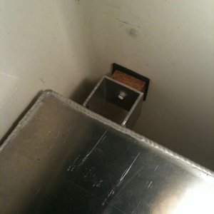 forward support: 1/4" bolt thru 2" sq. al. tube, oak block, rubber
