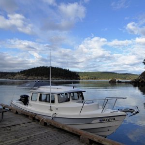 Monday morning, before the sun has risen above the island to warm up the boat.