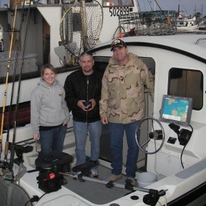 Cockpit of Long Story with daughter and Wounded Warriors opening day at Westport. Picture shows our style of boat with rear helm.