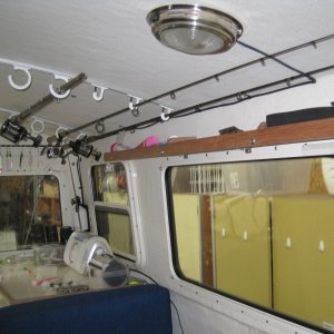 Port view, home made shelf above window, rod holder, top of storage locker
