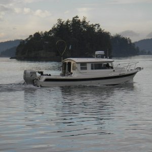 Media 'Underway at Deer Harbor' in album 'Cockpit of Long Story with daughter and Wounded Warriors opening day at Westport. Picture shows our style of boat with rear helm.'