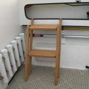 (CAVU) Steps hooked over the lower shelf edge ready for use on either side.