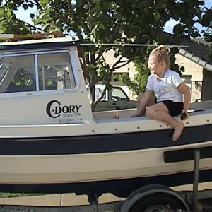 My little neighbor tom-boy playin' in my C-Dory