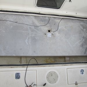 Leaking tank. Bottom of pic is too the stern. Two spacers in bilge have worn hole in tank about 1 1/2" up from the bottom