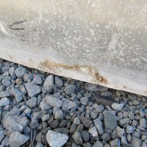 Media 'Actual area that was leaking.  The other side was close.  What lay underneath was unknown until the tank was removed.' in album 'Leaking tank. Bottom of pic is too the stern. Two spacers in bilge have worn hole in tank about 1 1/2" up from the bottom'