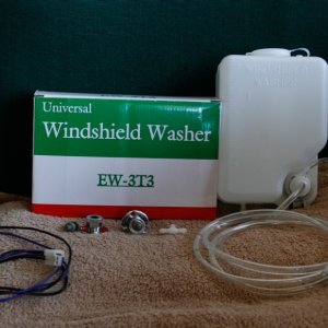 Washer-Kit with reservoir, hose, electicsl connector nozzles and T fitting.