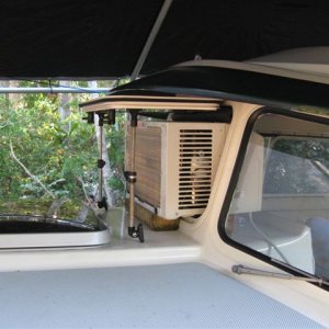 (004 4) AC viewed from side, plenty of room for brackets and protected from rain by window