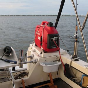 Media '(021 21) My Baby!  EU1000 Honda bungeed to Port Lazarette with extension cord through cabin bulkhead.  About 6 hours between refills.' in album '(014 14) Window brackets disconnected and standing vertical to hold window open.  Blocks in place for AC to sit on.'