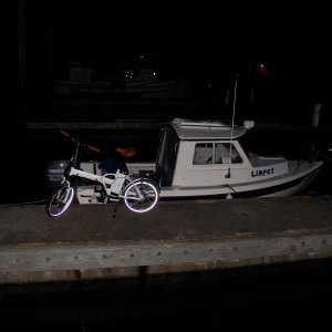Out of the bag and ready to go to town.  The "whitewalls" are reflective and it has LED head and tail lights.