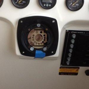 The adaptor in the hole but not bolted in yet
