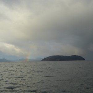 Media 'Bit of a squall up norht between Lummi and Orcas...hope it just stays up there. Vendovi in the foreground. Rain clouds so thick you can't even see Lummi or Orcas.' in album 'Lights installed, and boat loaded with presents for family, ready to depart Monday morning Dec 24th'