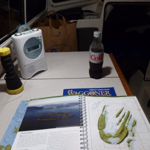Media 'Reading and listening to radio after sundown.' in album 'It's so nice to call ahead 15 minutes and arrive to find your boat in the water and ready to go!'