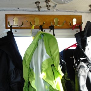 Coat Rack installed with 5200 adhesive. A must for all those wet jackets.