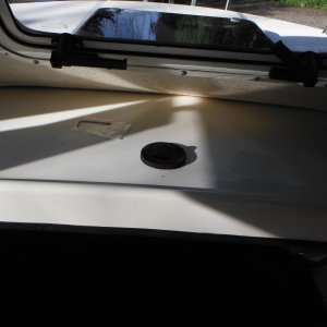 one of three defroster vents