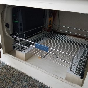 Pull out cabinet drawer installed under rear seat March 2018