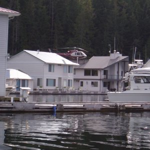 30 08 Sullivan Bay helicopter on top of floating home