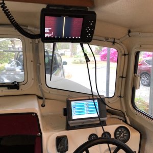 Inexpensive new sonar installed overhead.
Has no maps, but great for seeing the bottom while using other Garmin for mapping.