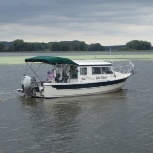 Media 'Lake Effect' in album '"Game On" a 19' Angler out in front of Catfish Charlie's Restaurant, waiting for everyone else to show up for the National Mississippi River C-Brat Gathering in September.'