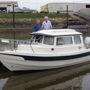 Media '' in album '"Game On" a 19' Angler out in front of Catfish Charlie's Restaurant, waiting for everyone else to show up for the National Mississippi River C-Brat Gathering in September.'