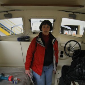 Dee checking out the inside of the almost done 25' C Dory. Is it really ours? 4/16/05