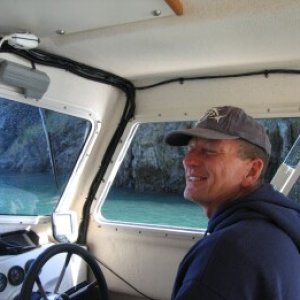 Dee's cousin David motoring the Knotty C through Canoe Pass (Deception Pass) N. Whidbey Island Island, WA